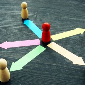 game pieces with different arrows of options of where to move