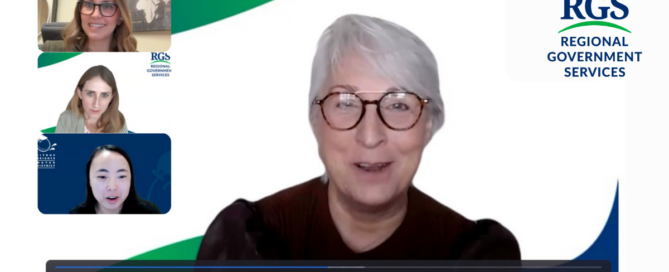 Screenshot of a virtual webinar with a speaker centered on an RGS-branded background and three participant thumbnails on the left.