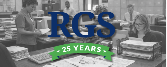 Black-and-white office scene with the RGS logo and a green “25 Years” banner.